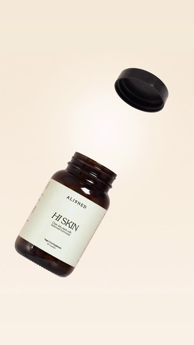 ALI9NED Hi Skin supplement bottle animation on a warm cream set