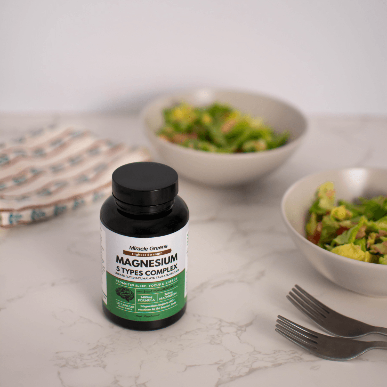 Magnesium supplements styled beside a meal and cutlery