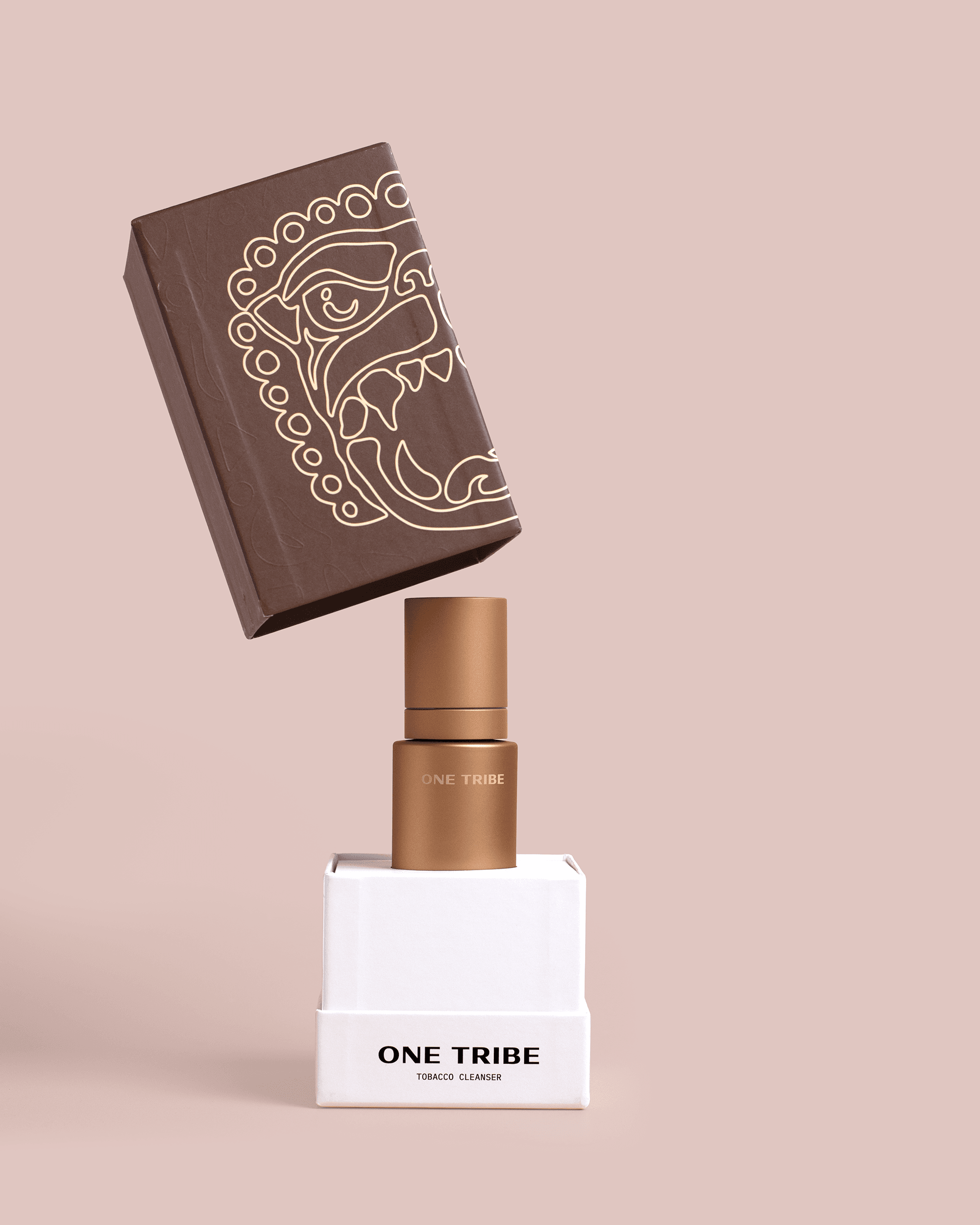 Gold skincare bottle on a white plinth with a floating brown carton